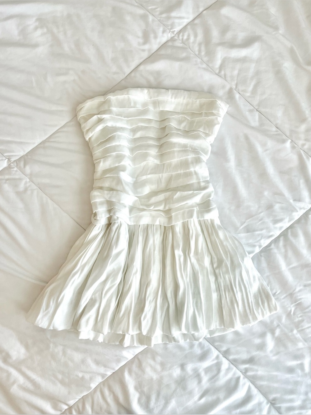 Adorable white rushed strapless mini dress